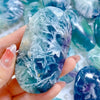 Polished Feather Snowflake Fluorite Palm Stone