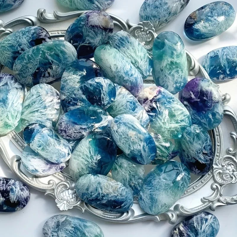 Polished Feather Snowflake Fluorite Palm Stone