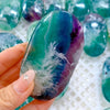 Polished Feather Snowflake Fluorite Palm Stone
