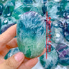 Polished Feather Snowflake Fluorite Palm Stone